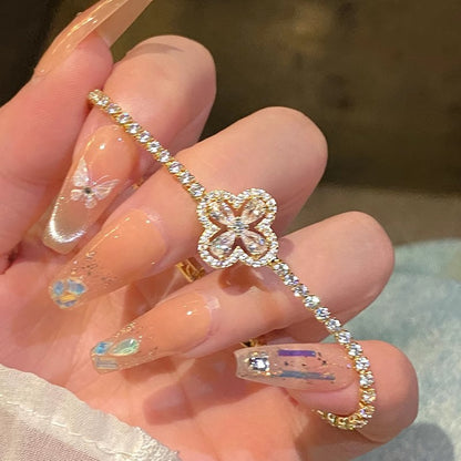 ✨Nueva colección 2026: Pulsera de trébol de cuatro hojas hueco súper brillante, pulsera de diamantes completa exquisita de lujo y nicho